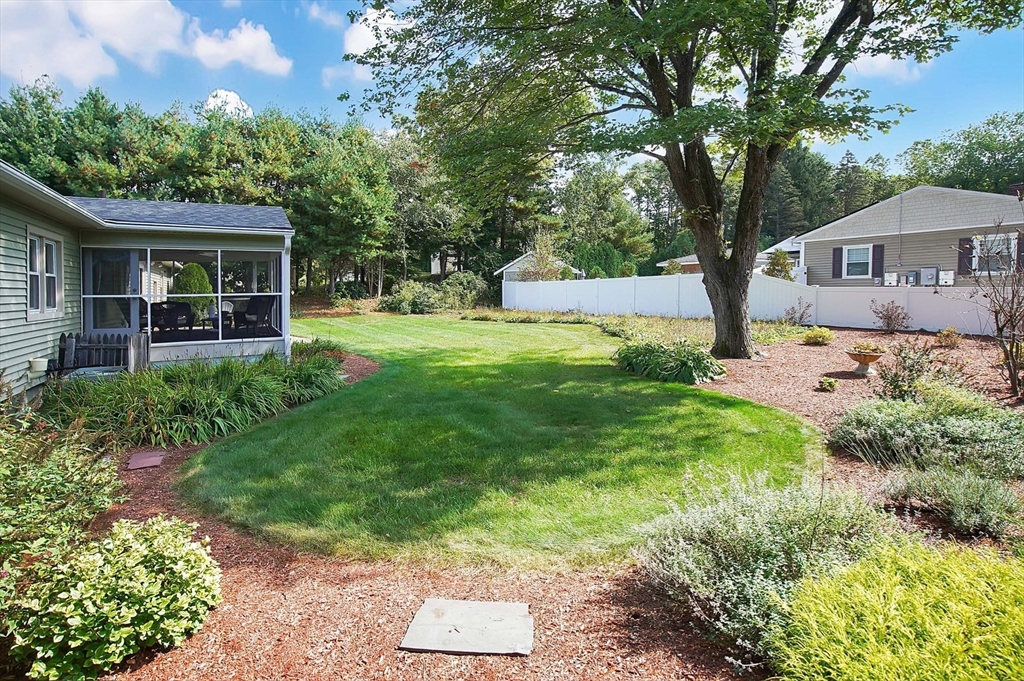407 Wolf Swamp Road Longmeadow, MA 01106 - Photo 38 of 42 a front view of a house with yard and green space