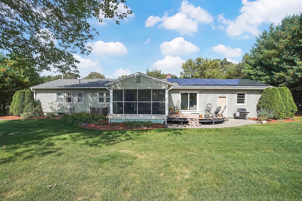 407 Wolf Swamp Road Longmeadow, MA 01106 - Photo 39 of 42 a view of a house with backyard sitting area and garden