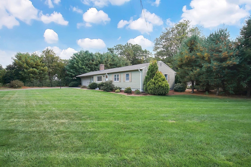 407 Wolf Swamp Road Longmeadow, MA 01106 - Photo 41 of 42 a view of a house with backyard and garden