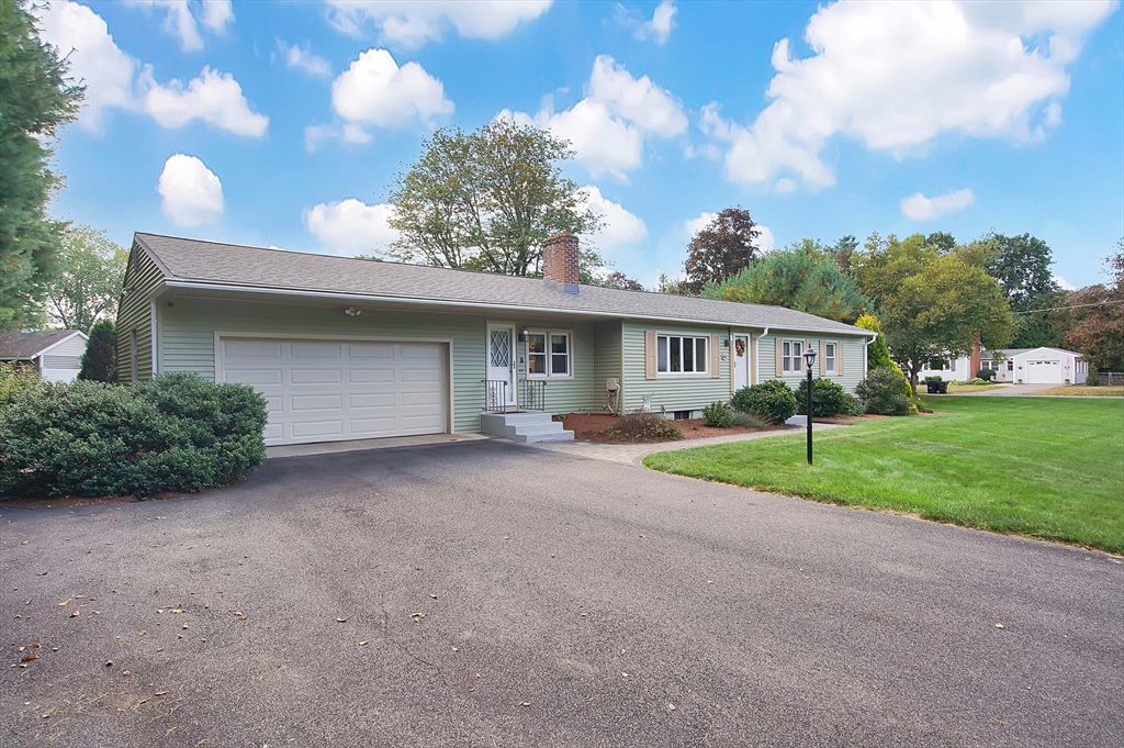 407 Wolf Swamp Road Longmeadow, MA 01106 - Photo 42 of 42 a view of a house with a yard and front view of a house