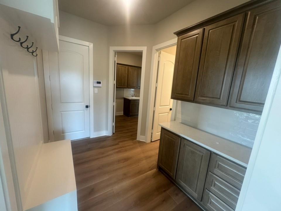 412 Indian Crk Road Van Alstyne, TX 75495 - Photo 16 of 24 a bathroom with a sink and a mirror