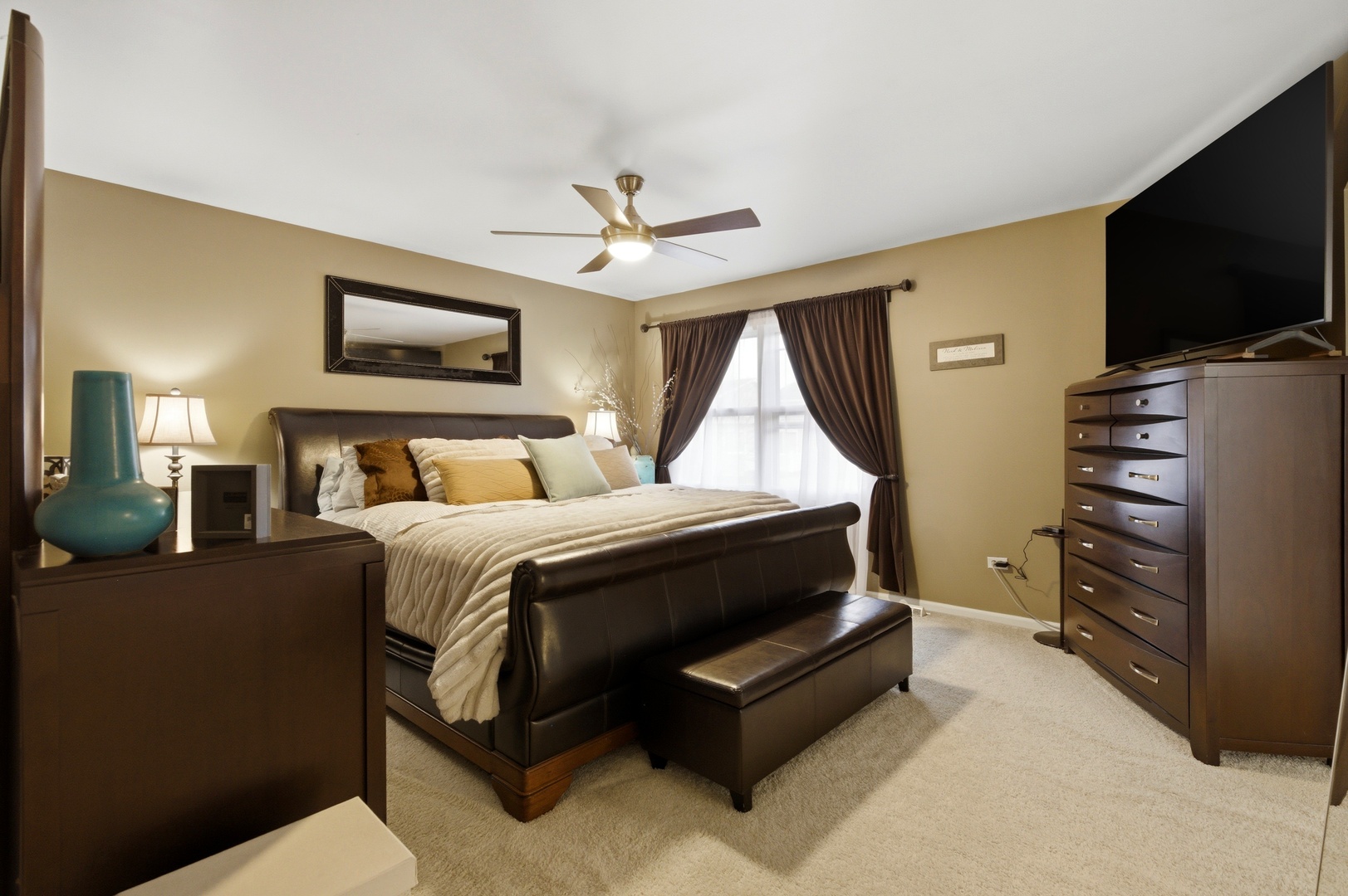 6900 Olde Gatehouse Road Tinley Park, IL 60477 - Photo 25 of 37 a bedroom with a bed and a flat screen tv