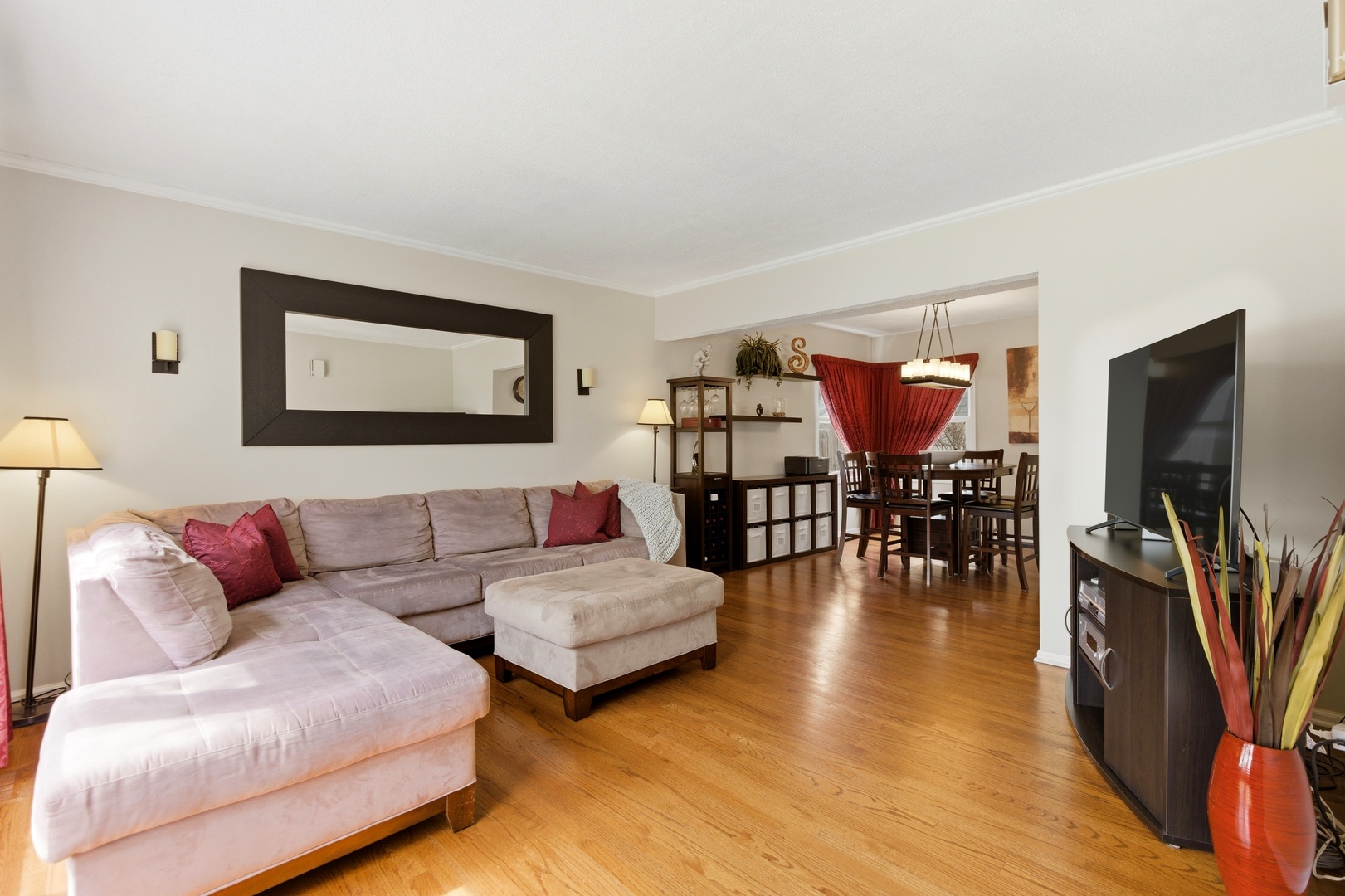 6900 Olde Gatehouse Road Tinley Park, IL 60477 - Photo 9 of 37 a living room with furniture and a flat screen tv