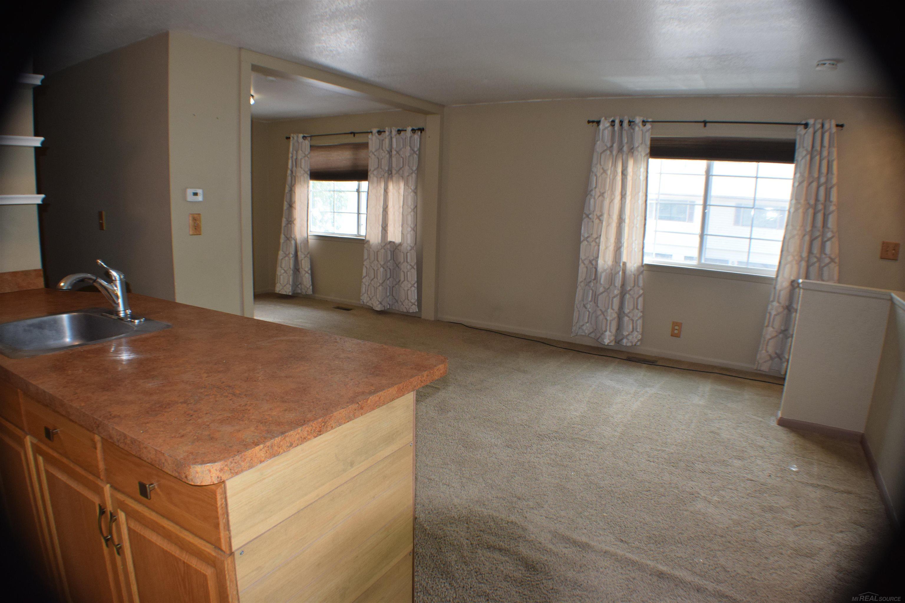 3944 Hunters Ridge Drive Lansing, MI 48911 - Photo 6 of 32 50147093-2fe9ac82-33b4-47bf-866d-cba8bb52b1c0.JPG
