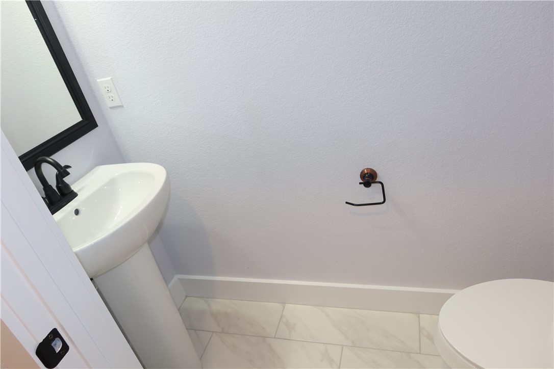 1971 Cambria Drive Bryan, TX 77807 - Photo 16 of 23 a bathroom with a sink and mirror