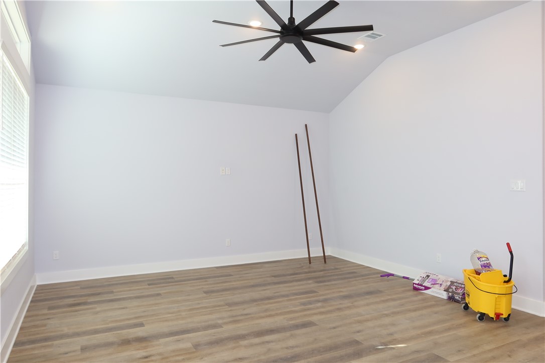 1971 Cambria Drive Bryan, TX 77807 - Photo 7 of 23 a view of a room with wooden floor and window