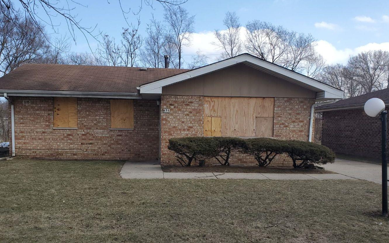 451 Hamlin Street Gary, IN 46406 - Photo 1 of 1 a front view of a house with parking
