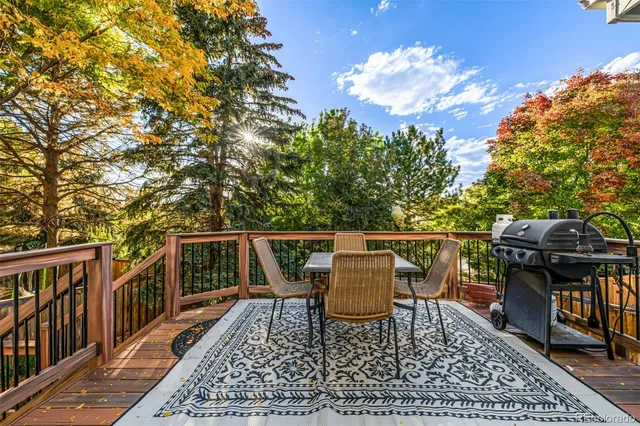 a view of a patio with wooden floor