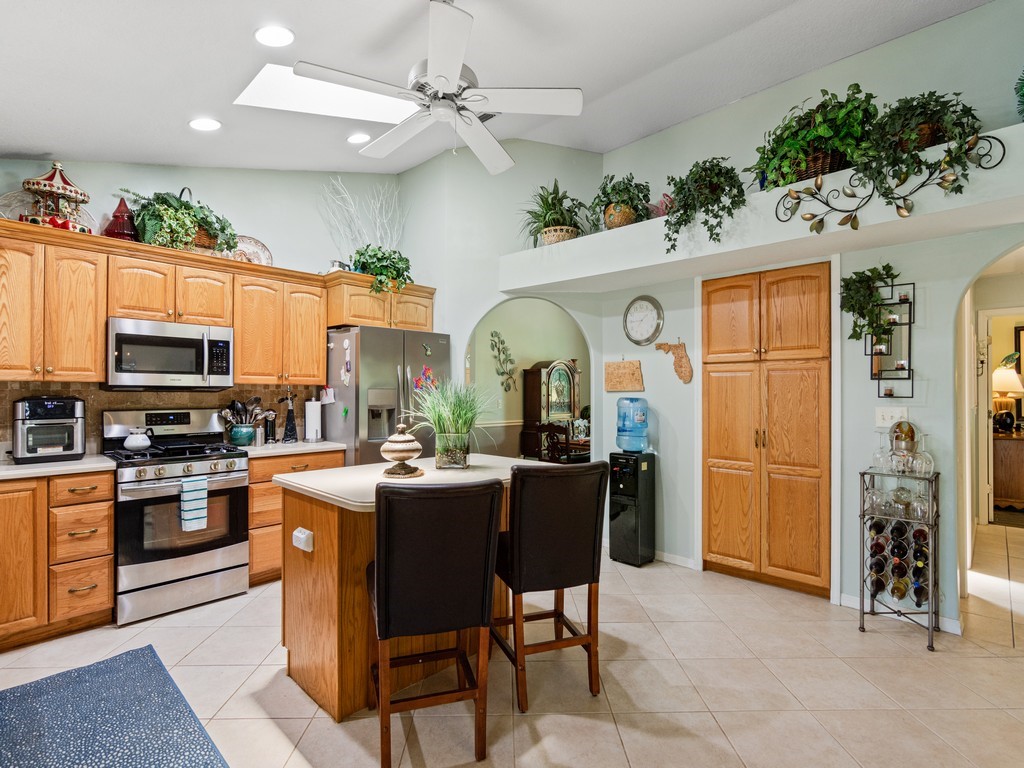 5302 Seminole Road Fort Pierce, FL 34951 - Photo 11 of 36 a view of a dining room with furniture window and wooden floor