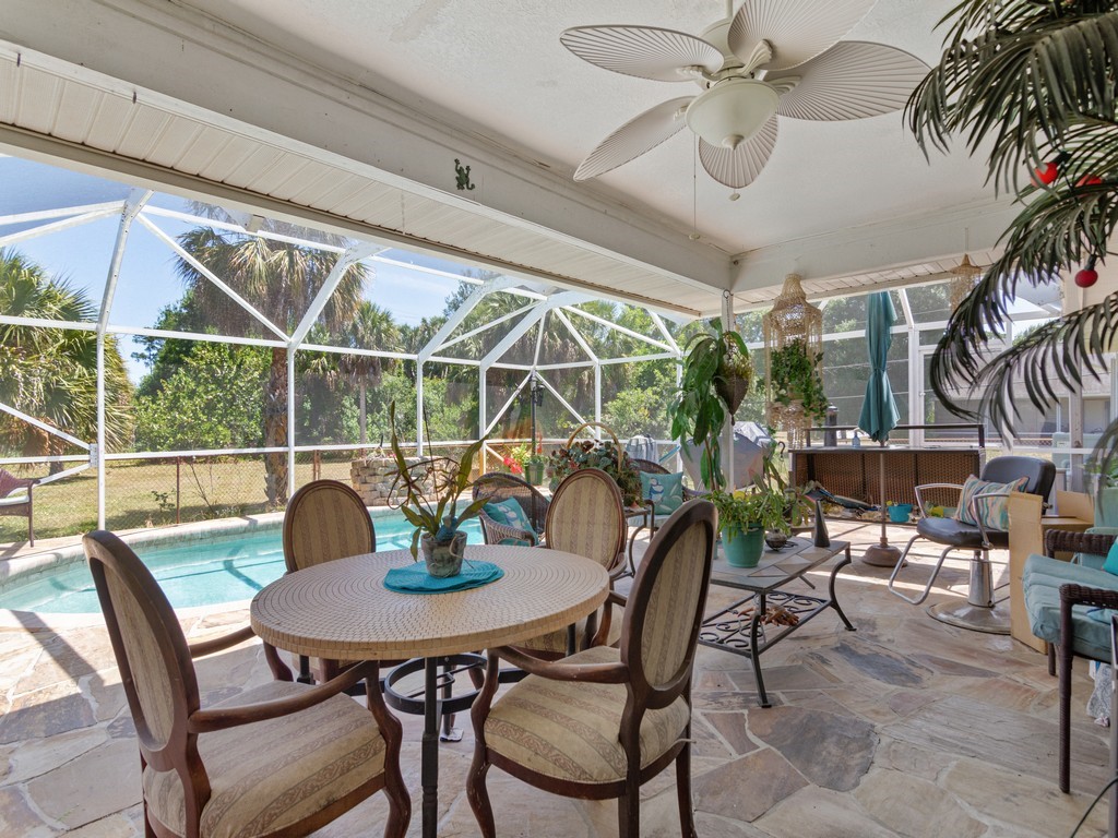 5302 Seminole Road Fort Pierce, FL 34951 - Photo 24 of 36 a dining room with furniture and window