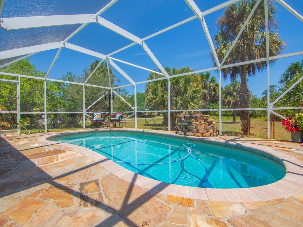 5302 Seminole Road Fort Pierce, FL 34951 - Photo 26 of 36 a view of a backyard