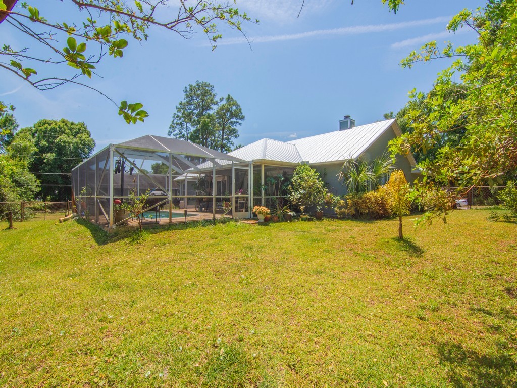 5302 Seminole Road Fort Pierce, FL 34951 - Photo 28 of 36 a view of a swimming pool with an ocean view