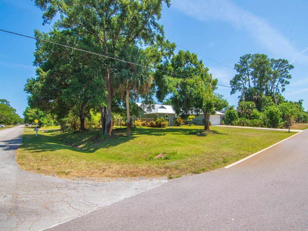 5302 Seminole Road Fort Pierce, FL 34951 - Photo 31 of 36 a view of a park with large trees
