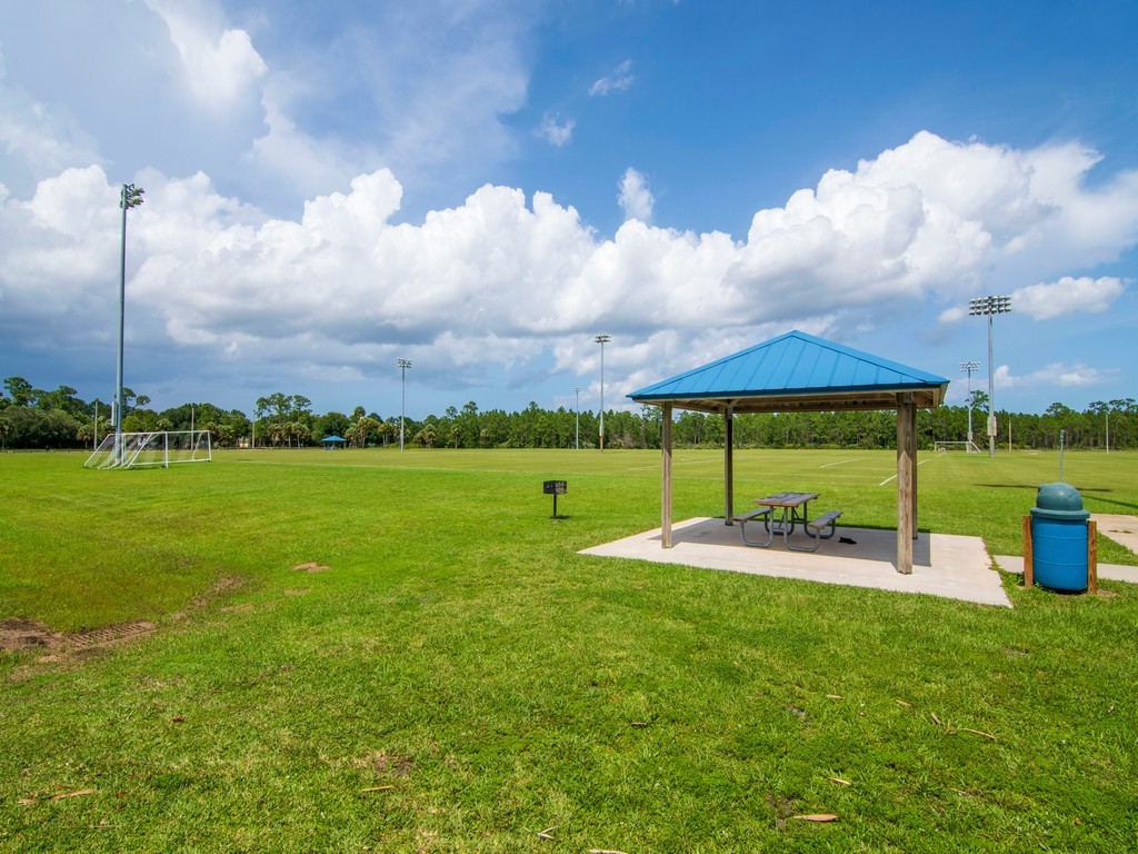5302 Seminole Road Fort Pierce, FL 34951 - Photo 36 of 36 a view of a garden with a play ground