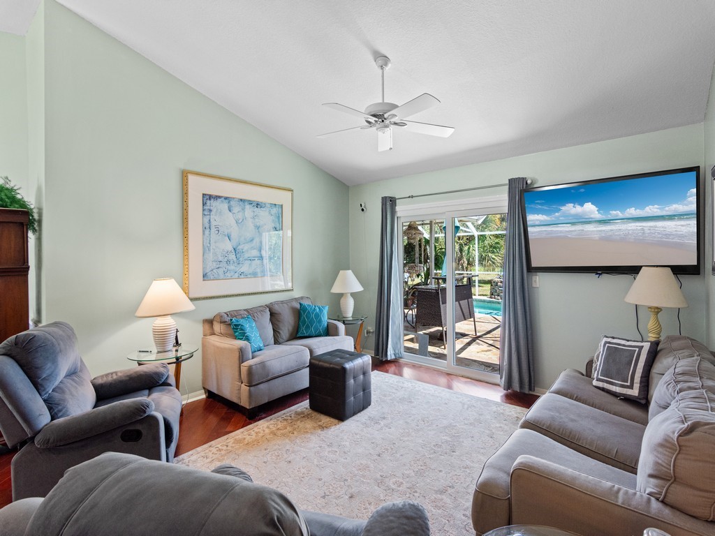 5302 Seminole Road Fort Pierce, FL 34951 - Photo 5 of 36 a living room with furniture and a window