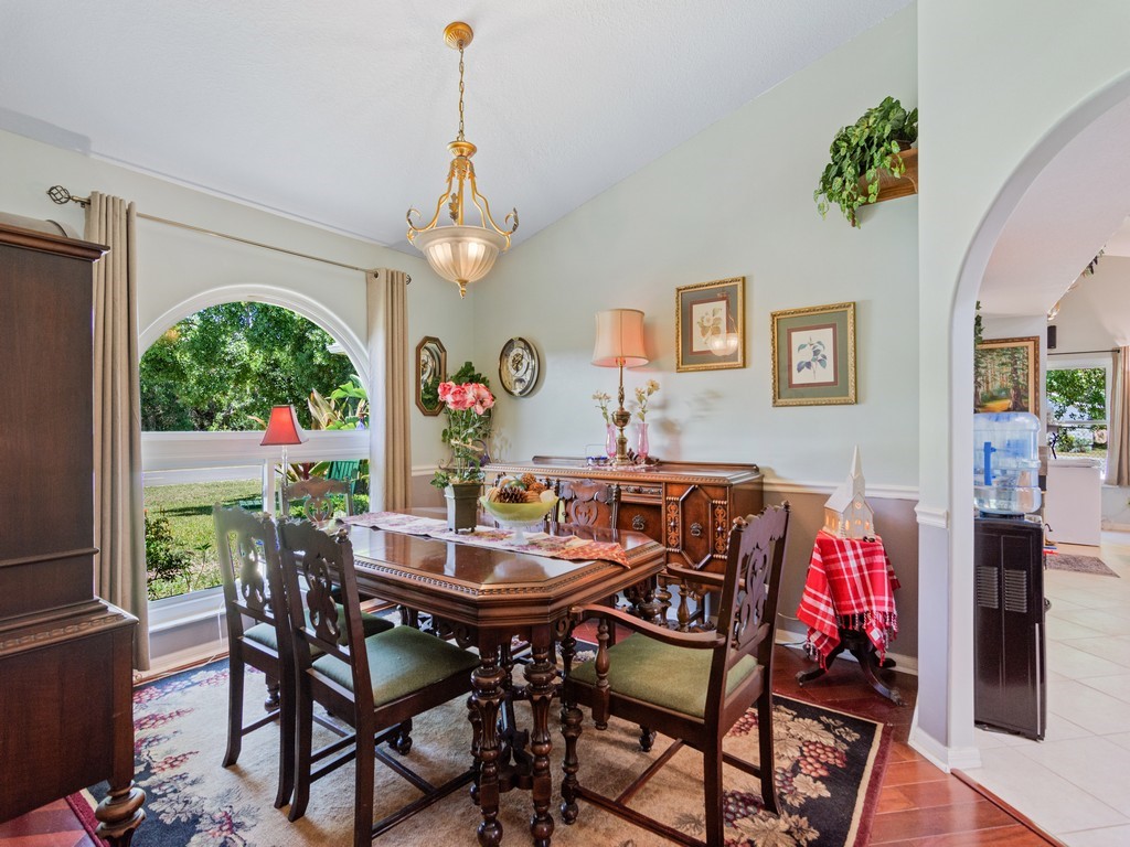 5302 Seminole Road Fort Pierce, FL 34951 - Photo 8 of 36 a view of a dining room with furniture window and outside view