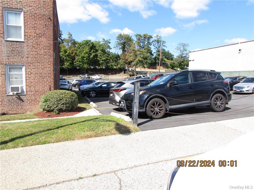 1561 Central Park Avenue, Unit I5 Yonkers, NY 10710 - Photo 15 of 18 View of parking with cooling unit