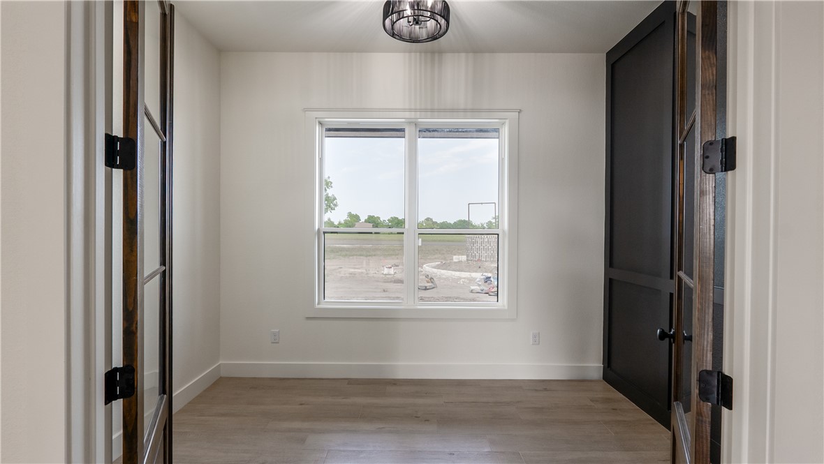 10017 Panther Creek Road Iola, TX 77861 - Photo 17 of 32 a view of window in an empty room