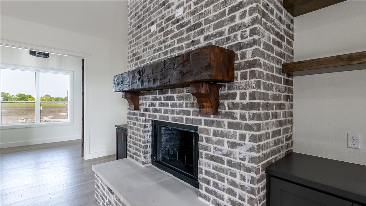 10017 Panther Creek Road Iola, TX 77861 - Photo 6 of 32 a brick oven with a fireplace in it