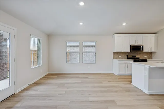 a view of kitchen and microwave