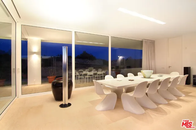 a kitchen with a sink and a refrigerator