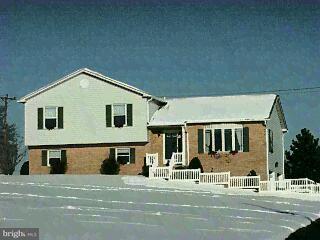 1017 Valley View Road York, PA 17406 - Photo 1 of 1 a front view of a house with a yard