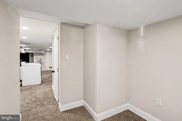 a view of a room that has a window in it