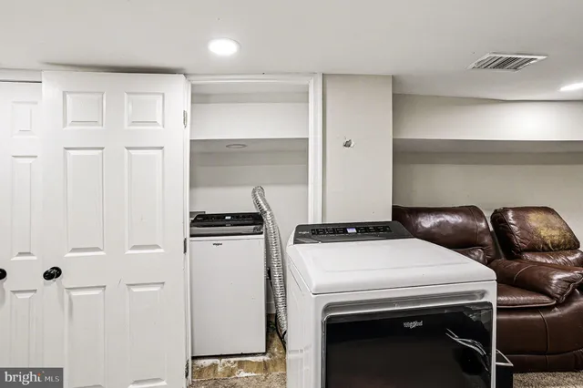 a bathroom with a sink a shower and a mirror