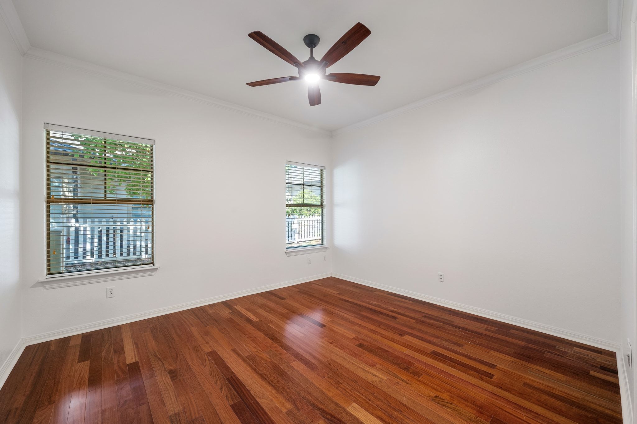 6801 Beckett Road, Unit 134L Austin, TX 78749 - Photo 16 of 30 wooden floor in an empty room with a window