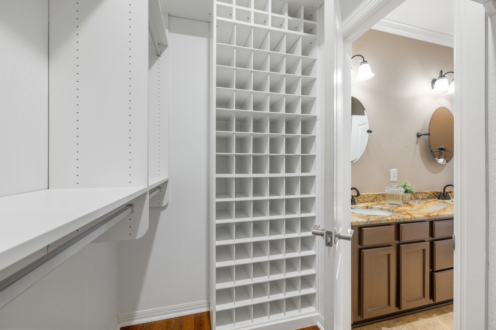 6801 Beckett Road, Unit 134L Austin, TX 78749 - Photo 19 of 30 a bathroom with a sink a vanity and a mirror