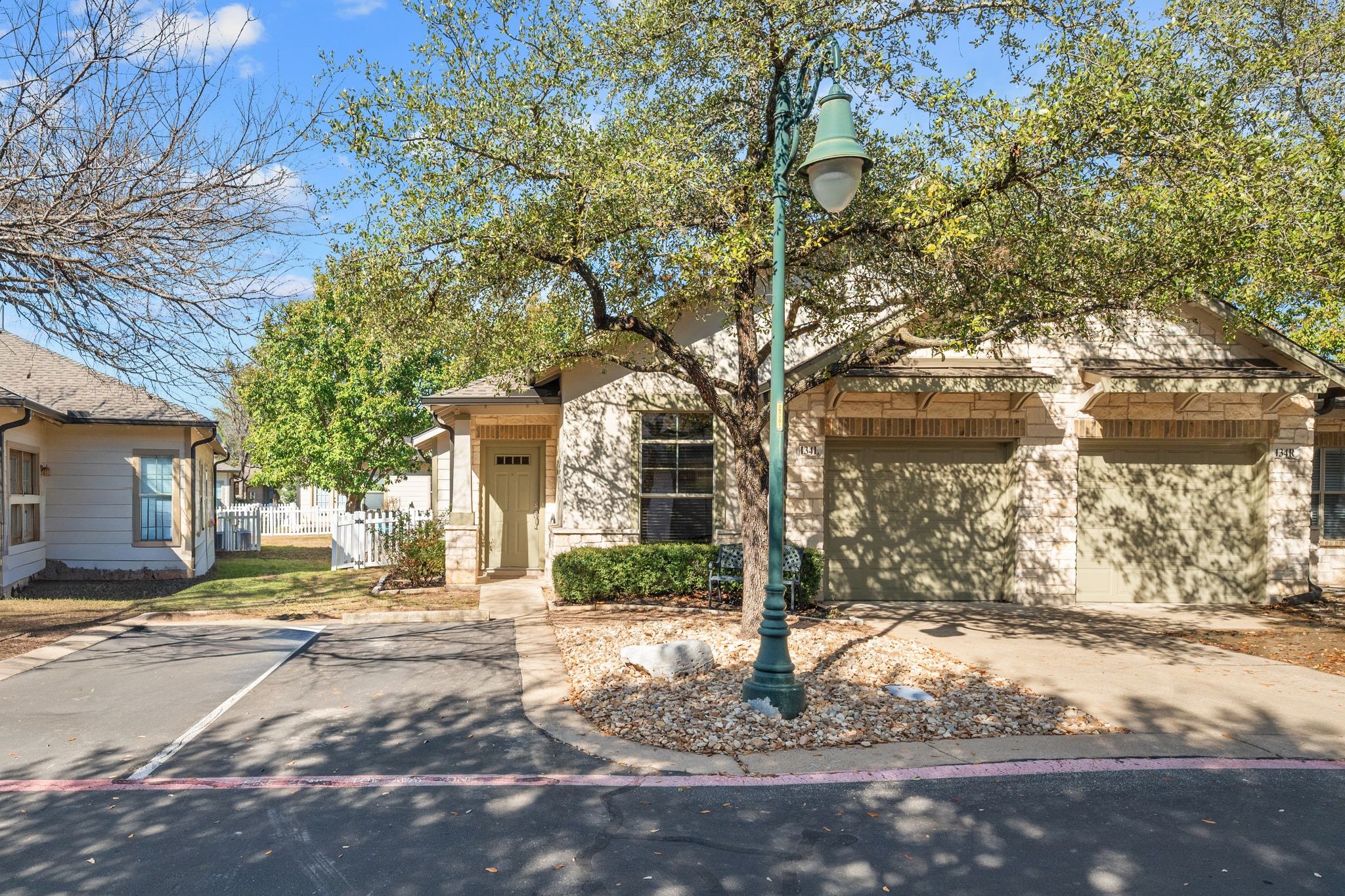 6801 Beckett Road, Unit 134L Austin, TX 78749 - Photo 2 of 30 a front view of a house with a yard