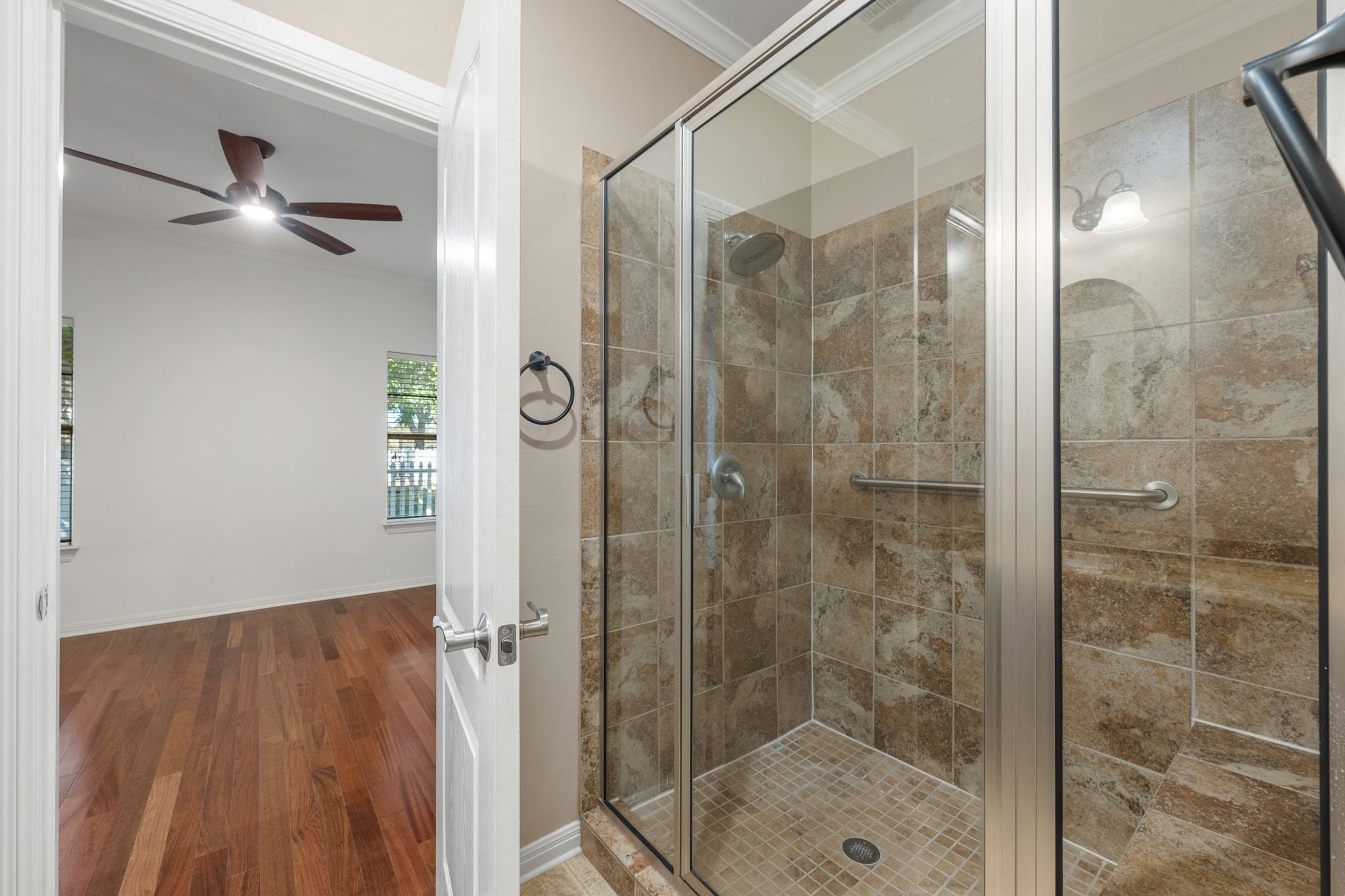 6801 Beckett Road, Unit 134L Austin, TX 78749 - Photo 21 of 30 a bathroom with a shower and a mirror