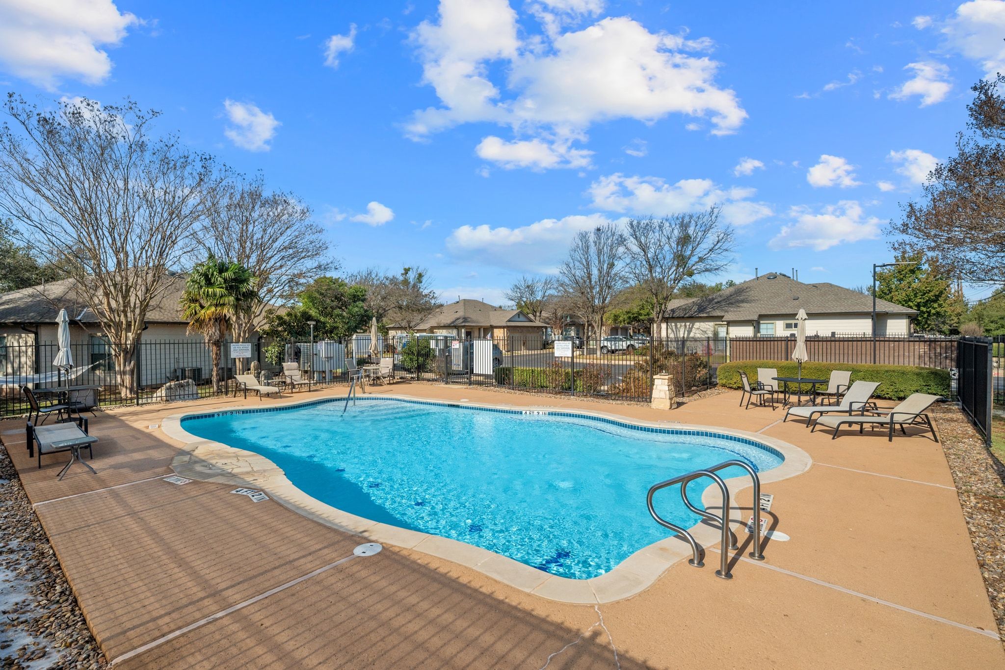 6801 Beckett Road, Unit 134L Austin, TX 78749 - Photo 27 of 30 a view of a swimming pool with lounge chairs