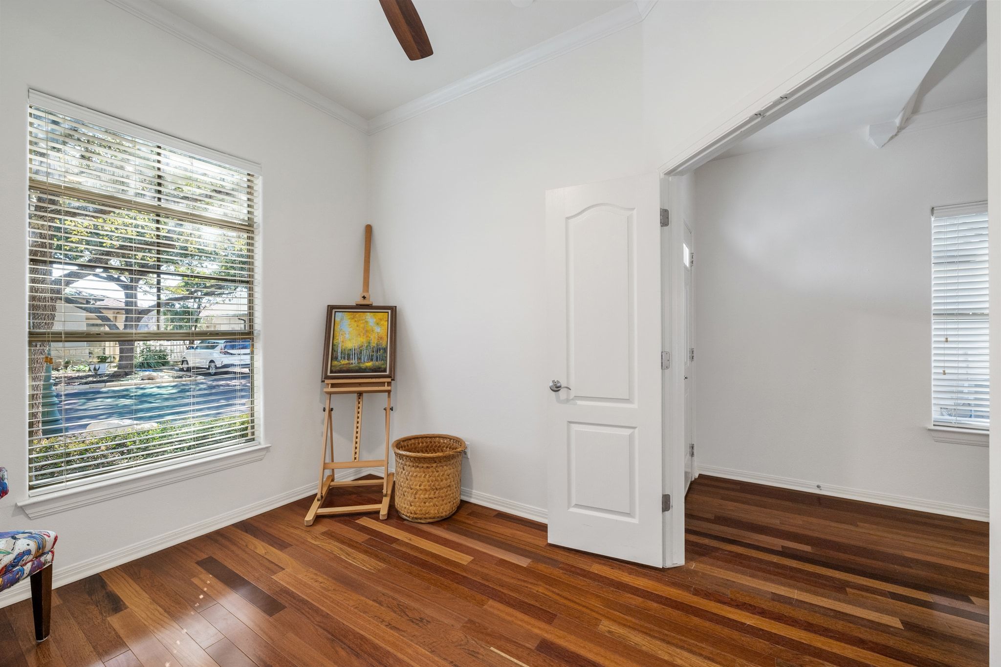 6801 Beckett Road, Unit 134L Austin, TX 78749 - Photo 9 of 30 a view of an empty room with window and wooden floor