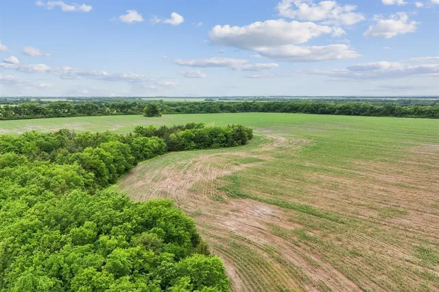 a view of a lake with a big yard