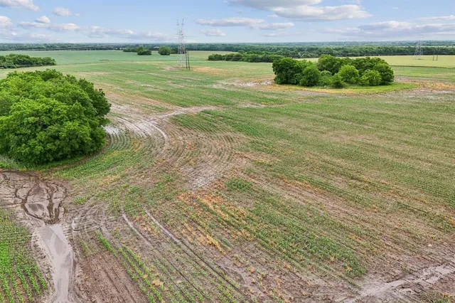 a view of a lake with a building in the background
