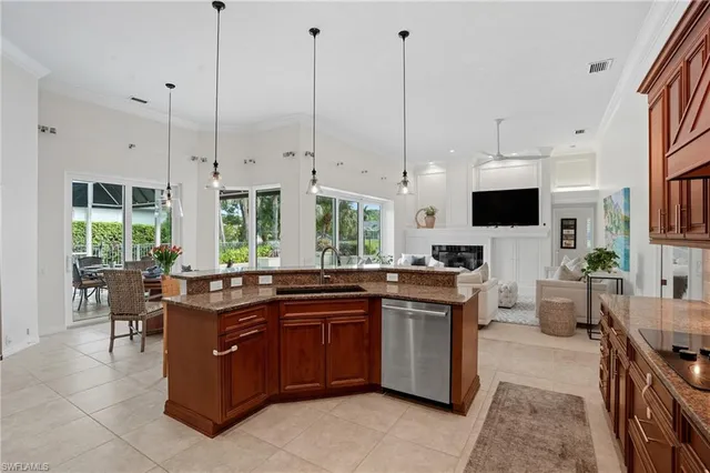 a kitchen with a sink stove and wooden cabinets