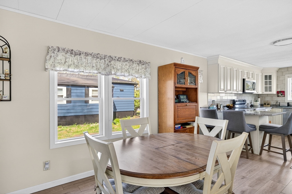 19 Timber Lane Wareham, MA 02571 - Photo 10 of 38 a dining room with furniture and window