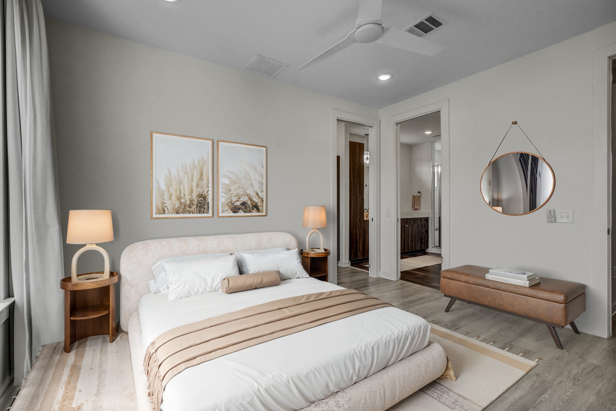 2624 Metcalfe Road, Unit 17 Austin, TX 78741 - Photo 19 of 35 a bedroom with a large bed and a chandelier