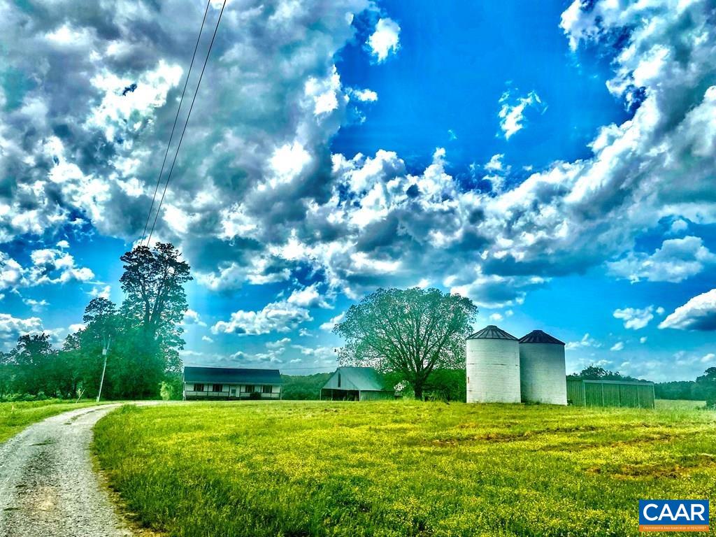 2586 Five Forks Road Pamplin, VA 23958 - Photo 21 of 22 a view of a big yard with a house