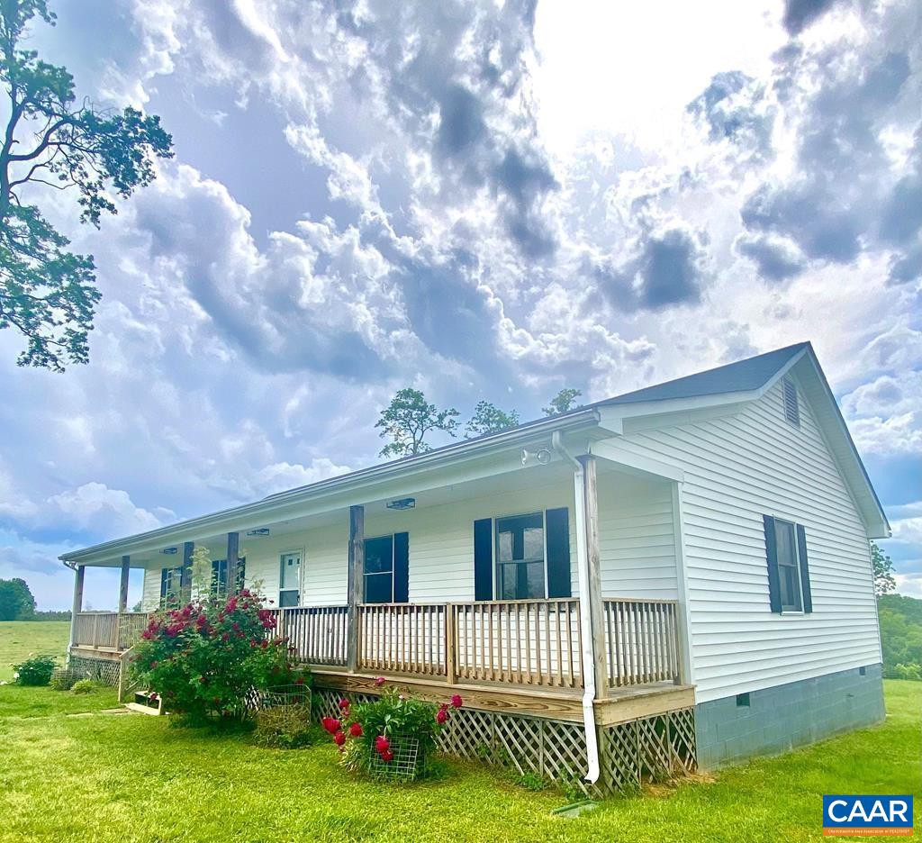 2586 Five Forks Road Pamplin, VA 23958 - Photo 3 of 22 a front view of a house with a garden