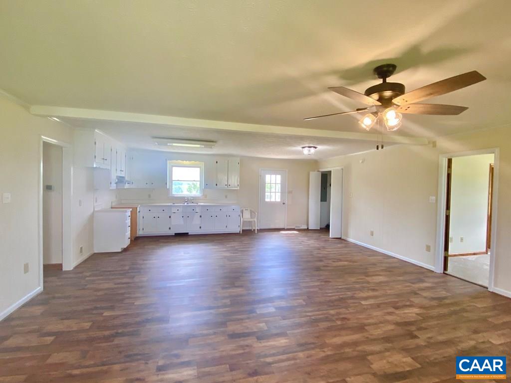 2586 Five Forks Road Pamplin, VA 23958 - Photo 4 of 22 a view of empty room with wooden floor and fan
