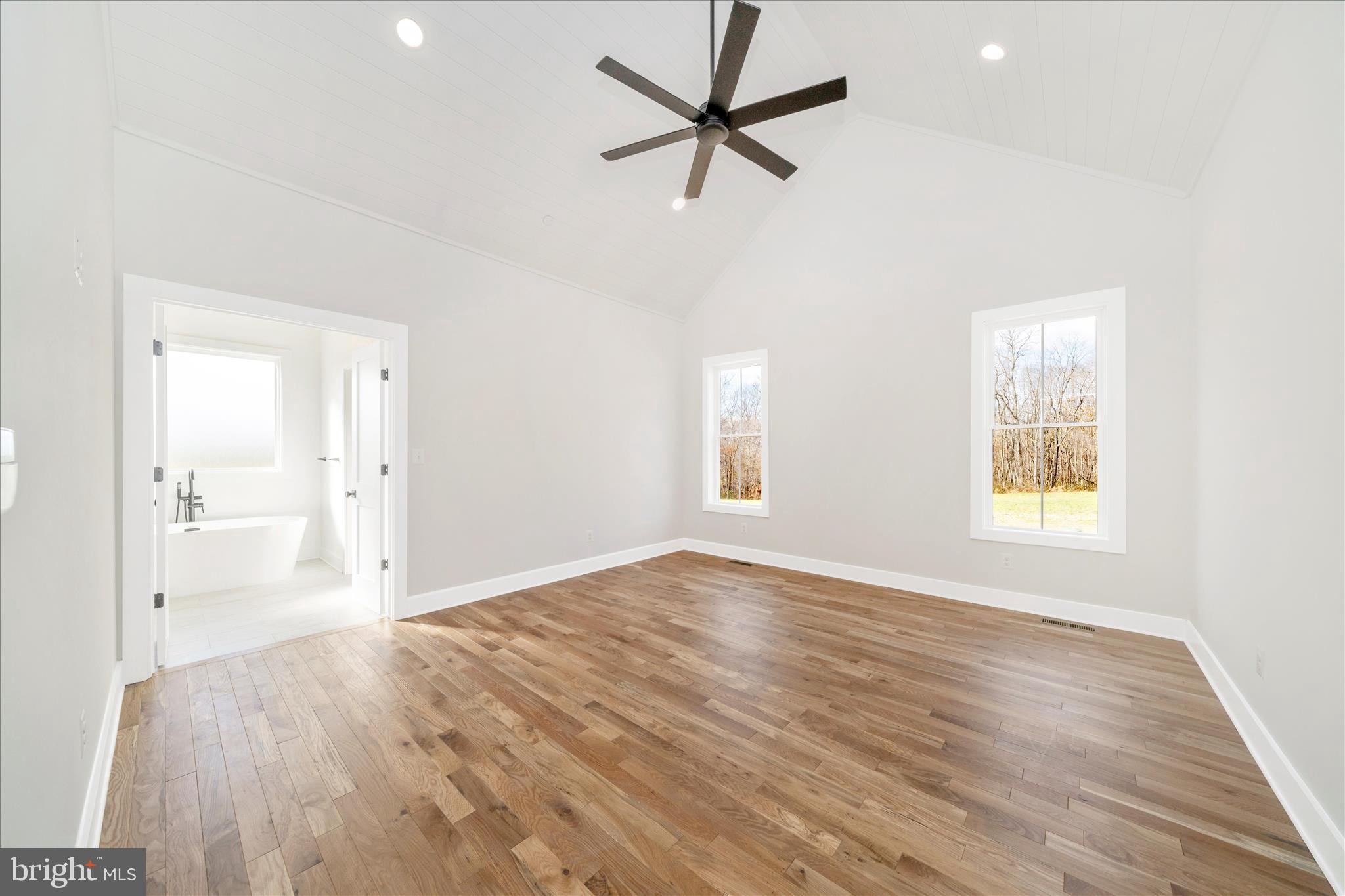 15030 New Windsor Road New Windsor, MD 21776 - Photo 22 of 63 wooden floor in an empty room with a window