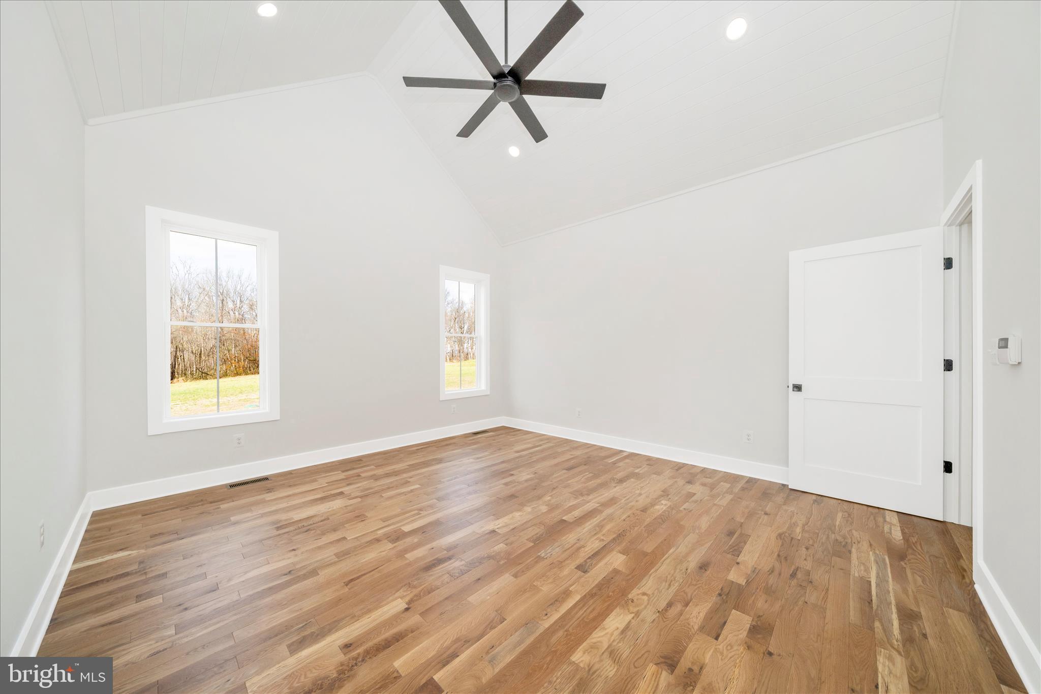 15030 New Windsor Road New Windsor, MD 21776 - Photo 25 of 63 wooden floor in an empty room with a window