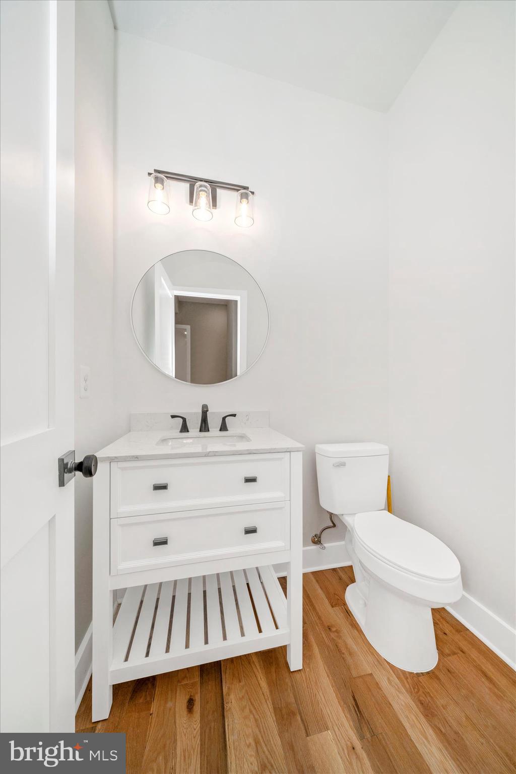 15030 New Windsor Road New Windsor, MD 21776 - Photo 30 of 63 a bathroom with a sink and a mirror