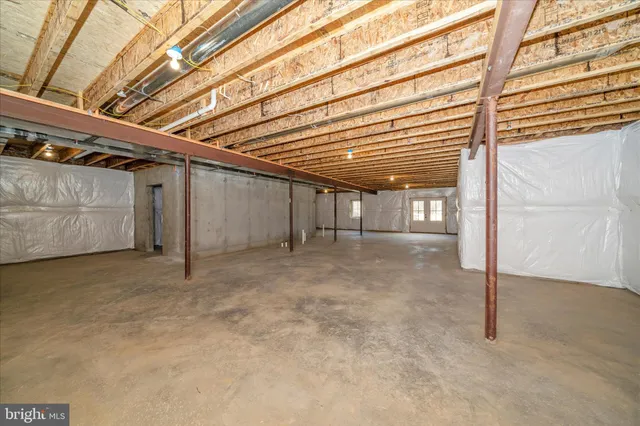 a view of a swimming pool with an outdoor seating area