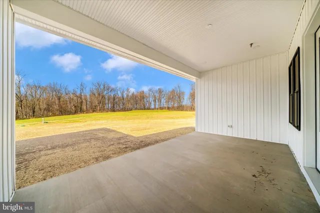 a view of a swimming pool and lounge chair