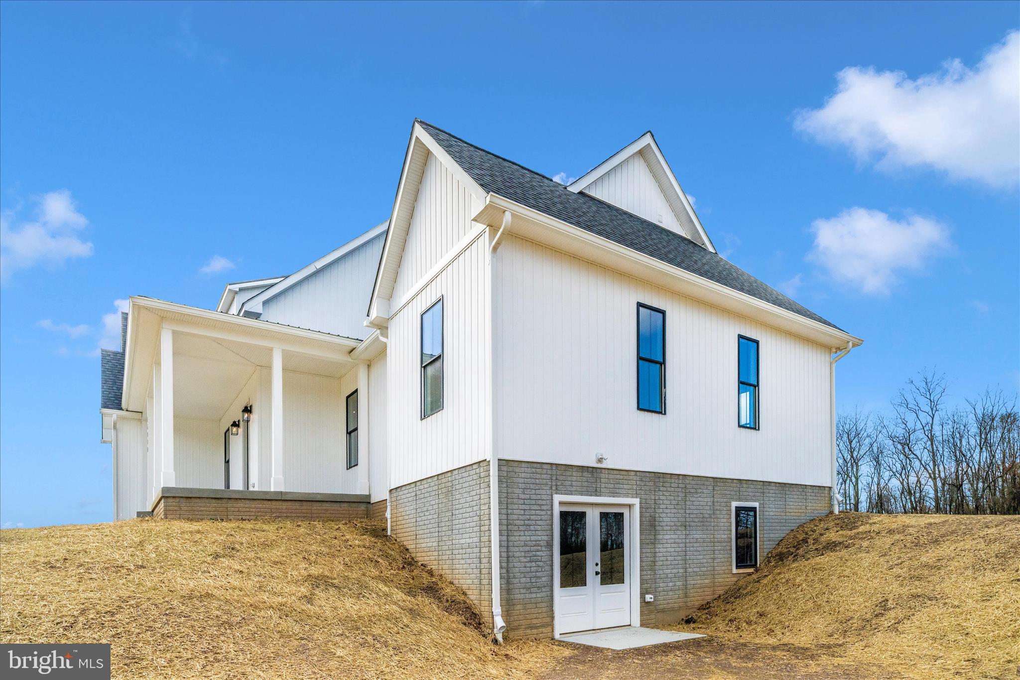 15030 New Windsor Road New Windsor, MD 21776 - Photo 52 of 63 a front view of a house with a yard