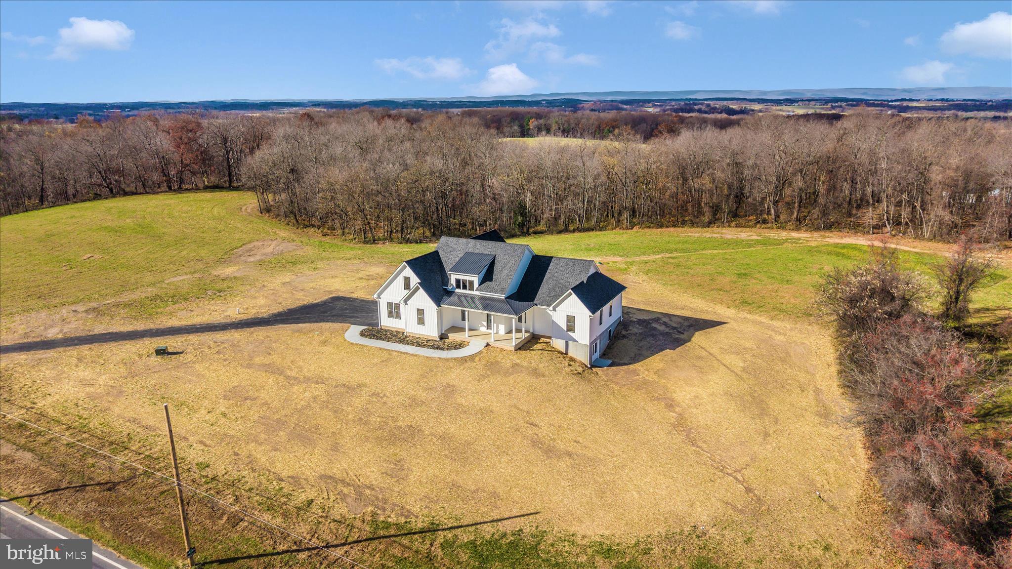 15030 New Windsor Road New Windsor, MD 21776 - Photo 59 of 63 a view of a swimming pool and lounge chair
