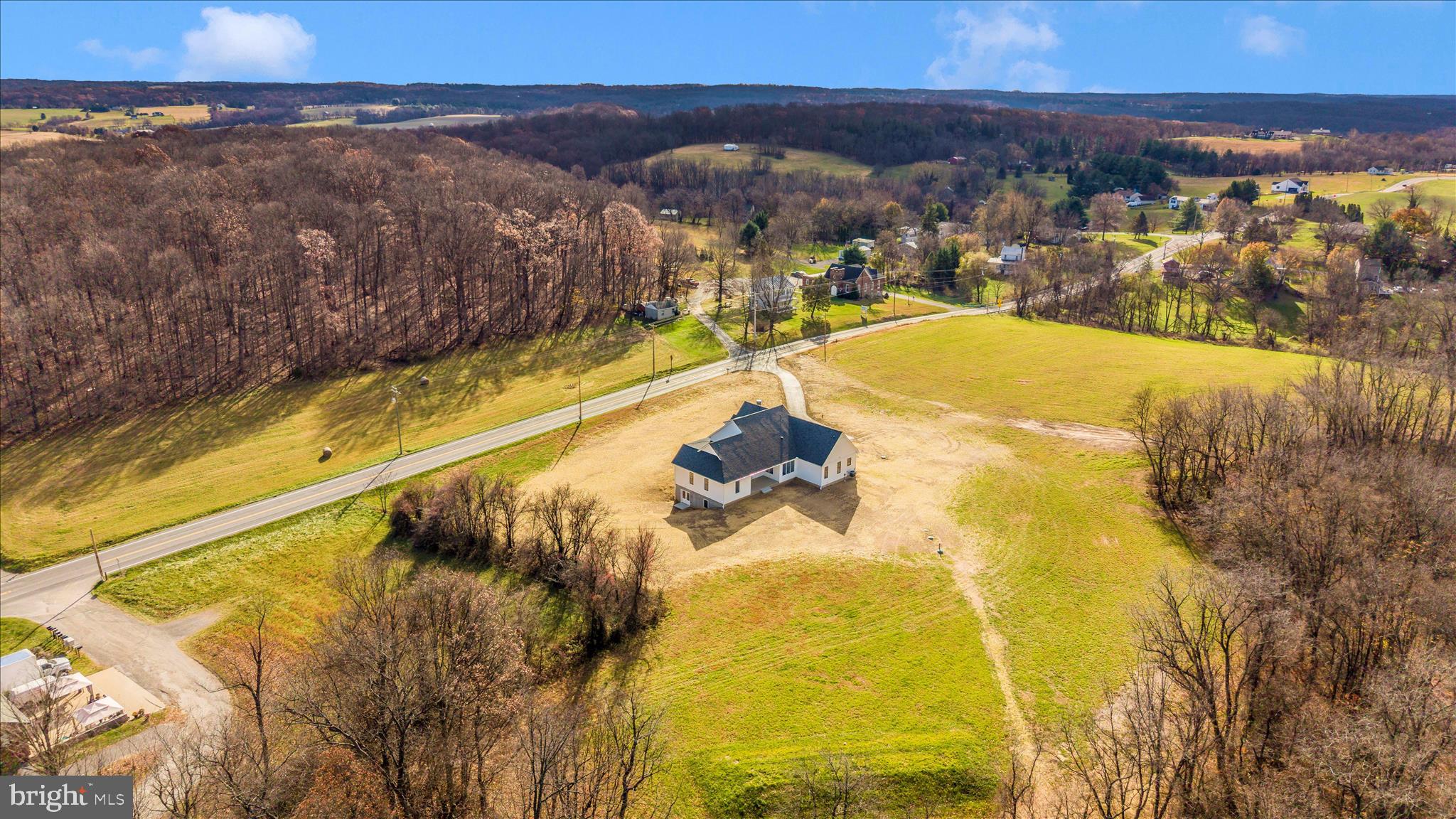 15030 New Windsor Road New Windsor, MD 21776 - Photo 62 of 63 a view of a swimming pool with seating area
